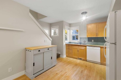 225 Bridlewood Lane Sw, Calgary, AB - Indoor Photo Showing Kitchen With Double Sink