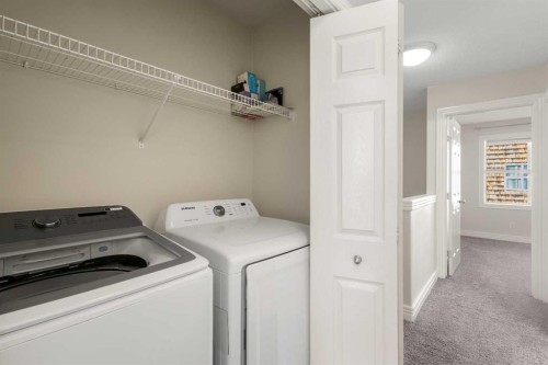 225 Bridlewood Lane Sw, Calgary, AB - Indoor Photo Showing Laundry Room
