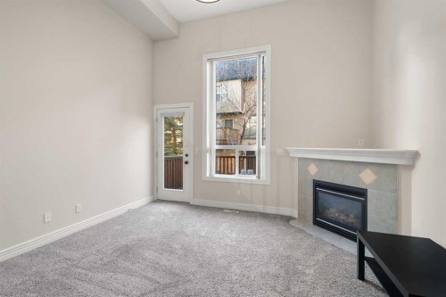 225 Bridlewood Lane Sw, Calgary, AB - Indoor With Fireplace