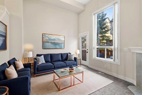 225 Bridlewood Lane Sw, Calgary, AB - Indoor Photo Showing Living Room
