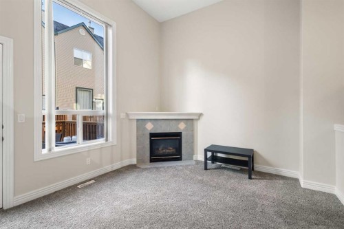 225 Bridlewood Lane Sw, Calgary, AB - Indoor With Fireplace