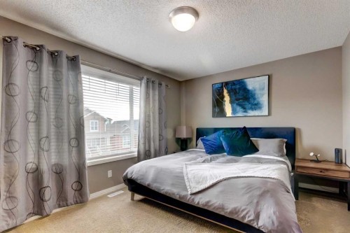 207 Cranford Crescent Se, Calgary, AB - Indoor Photo Showing Bedroom