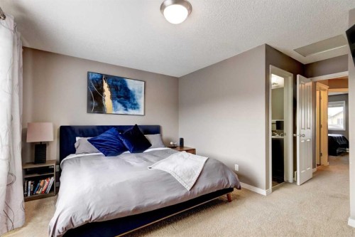 207 Cranford Crescent Se, Calgary, AB - Indoor Photo Showing Bedroom