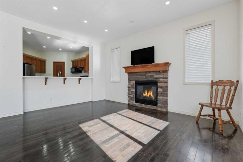 45 Everglen Crescent Sw, Calgary, AB - Indoor Photo Showing Living Room With Fireplace