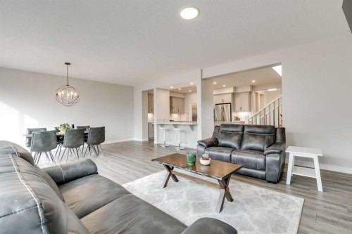 57 Magnolia Heath Se, Calgary, AB - Indoor Photo Showing Living Room