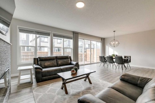 57 Magnolia Heath Se, Calgary, AB - Indoor Photo Showing Living Room