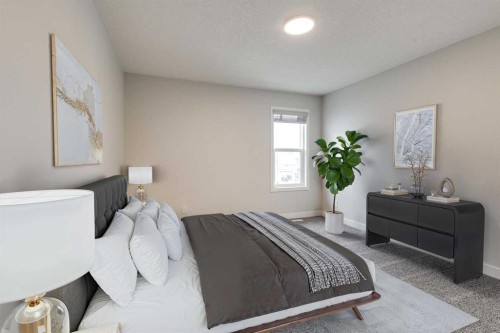57 Magnolia Heath Se, Calgary, AB - Indoor Photo Showing Bedroom