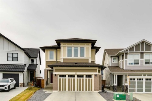 57 Magnolia Heath Se, Calgary, AB - Outdoor With Facade