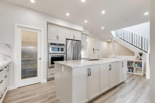 57 Magnolia Heath Se, Calgary, AB - Indoor Photo Showing Kitchen With Upgraded Kitchen