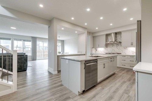 57 Magnolia Heath Se, Calgary, AB - Indoor Photo Showing Kitchen With Upgraded Kitchen
