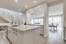 57 Magnolia Heath Se, Calgary, AB  - Indoor Photo Showing Kitchen With Upgraded Kitchen 
