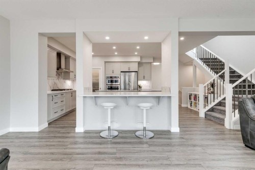 57 Magnolia Heath Se, Calgary, AB - Indoor Photo Showing Kitchen With Upgraded Kitchen