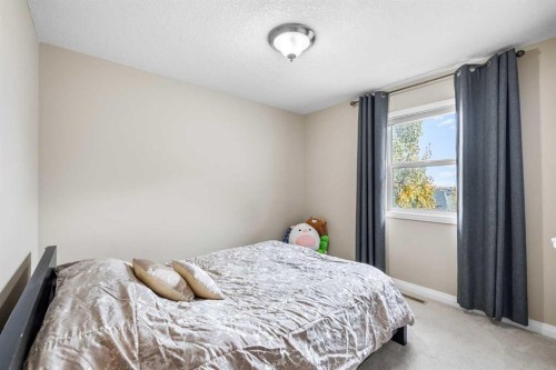 28 Panamount Common Nw, Calgary, AB - Indoor Photo Showing Bedroom