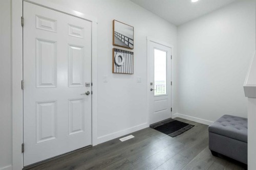 71 Heritage Manor, Cochrane, AB - Indoor Photo Showing Other Room