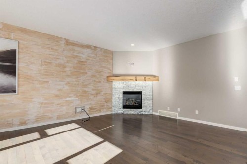 2016 Brightoncrest Green Se, Calgary, AB - Indoor Photo Showing Living Room With Fireplace