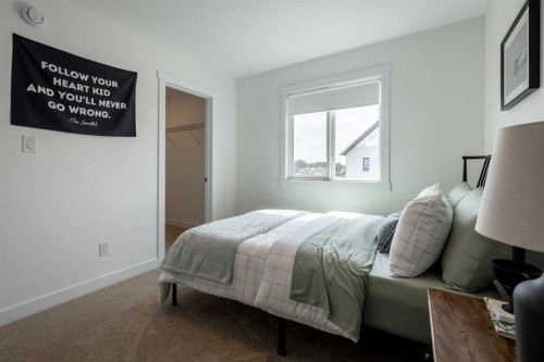 506 Ranch Green, Strathmore, AB - Indoor Photo Showing Bedroom