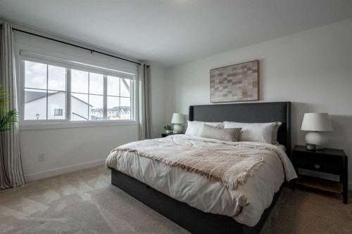 506 Ranch Green, Strathmore, AB - Indoor Photo Showing Bedroom