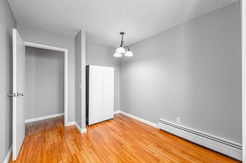 1709-4944 Dalton Drive Nw, Calgary, AB - Indoor Photo Showing Other Room