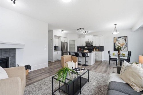 1096 Hillcrest Lane Sw, Airdrie, AB - Indoor Photo Showing Living Room