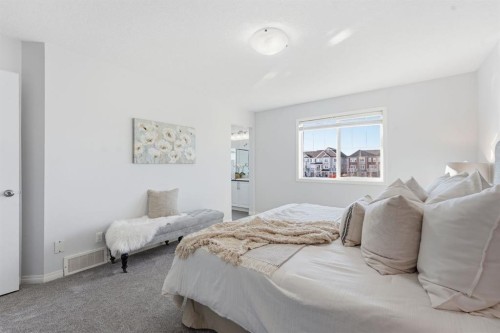 1096 Hillcrest Lane Sw, Airdrie, AB - Indoor Photo Showing Bedroom