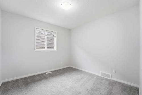 1096 Hillcrest Lane Sw, Airdrie, AB - Indoor Photo Showing Other Room