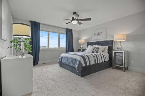 51 Cimarron Springs Circle, Okotoks, AB - Indoor Photo Showing Bedroom