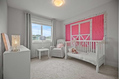 51 Cimarron Springs Circle, Okotoks, AB - Indoor Photo Showing Bedroom