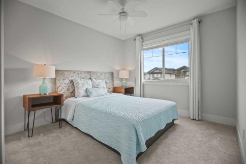 51 Cimarron Springs Circle, Okotoks, AB - Indoor Photo Showing Bedroom