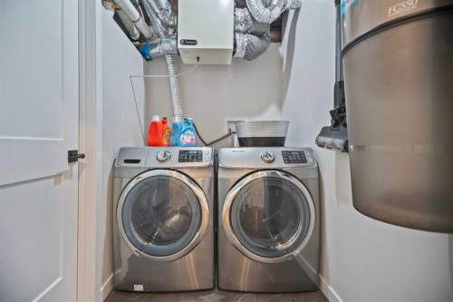 51 Cimarron Springs Circle, Okotoks, AB - Indoor Photo Showing Laundry Room
