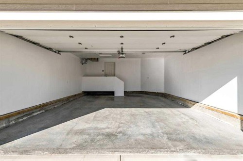 51 Cimarron Springs Circle, Okotoks, AB - Indoor Photo Showing Garage