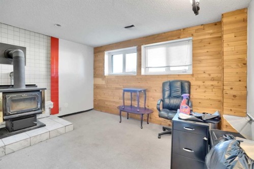 4764 Rundlewood Drive Ne, Calgary, AB - Indoor With Fireplace