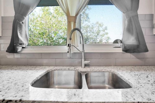 4764 Rundlewood Drive Ne, Calgary, AB - Indoor Photo Showing Kitchen With Double Sink