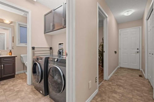 43 Sunset Crescent, Okotoks, AB - Indoor Photo Showing Laundry Room