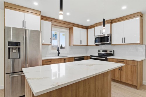 5 Del Monica Bay Ne, Calgary, AB - Indoor Photo Showing Kitchen With Stainless Steel Kitchen With Upgraded Kitchen