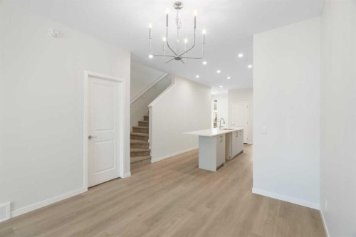 135 Creekview Gardens Sw, Calgary, AB - Indoor Photo Showing Other Room