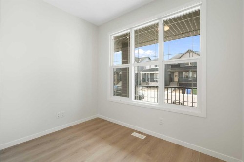 135 Creekview Gardens Sw, Calgary, AB - Indoor Photo Showing Other Room