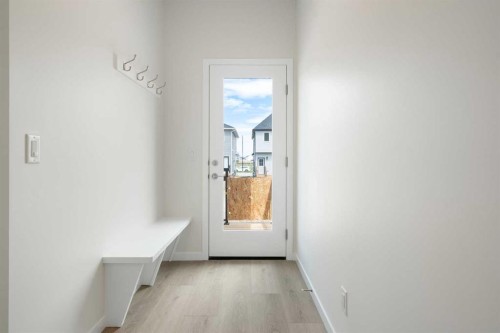 135 Creekview Gardens Sw, Calgary, AB - Indoor Photo Showing Other Room