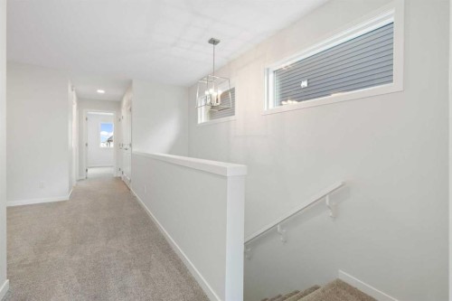 135 Creekview Gardens Sw, Calgary, AB - Indoor Photo Showing Other Room