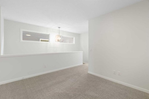 135 Creekview Gardens Sw, Calgary, AB - Indoor Photo Showing Other Room
