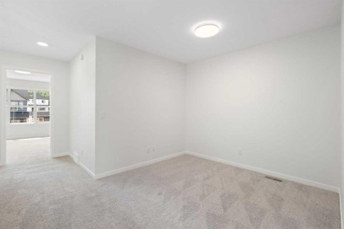 135 Creekview Gardens Sw, Calgary, AB - Indoor Photo Showing Other Room