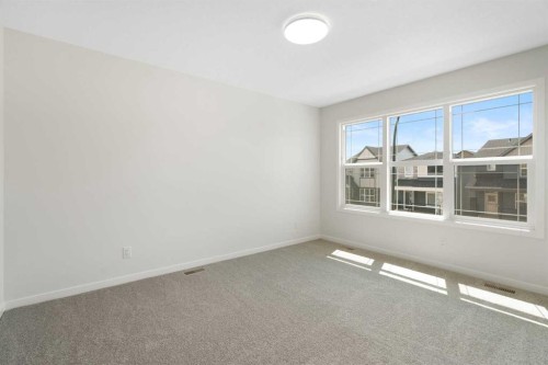 135 Creekview Gardens Sw, Calgary, AB - Indoor Photo Showing Other Room