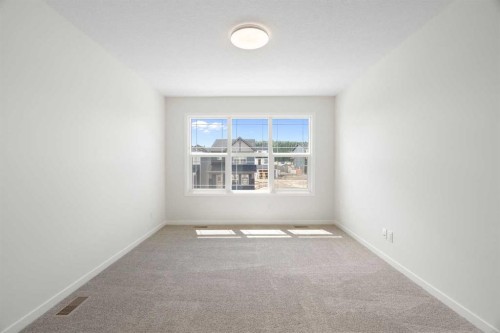 135 Creekview Gardens Sw, Calgary, AB - Indoor Photo Showing Other Room