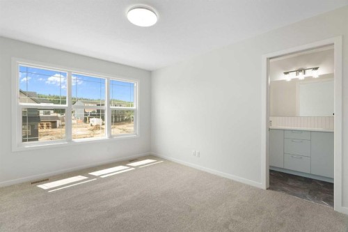 135 Creekview Gardens Sw, Calgary, AB - Indoor Photo Showing Other Room