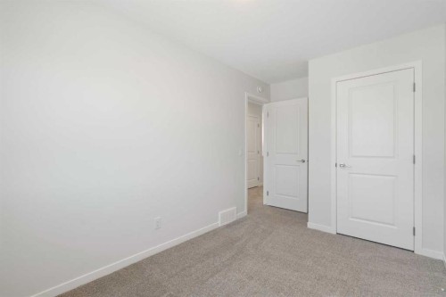 135 Creekview Gardens Sw, Calgary, AB - Indoor Photo Showing Other Room