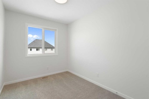 135 Creekview Gardens Sw, Calgary, AB - Indoor Photo Showing Other Room