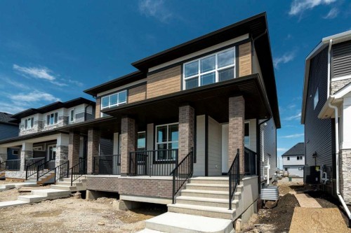 135 Creekview Gardens Sw, Calgary, AB - Outdoor With Deck Patio Veranda With Facade