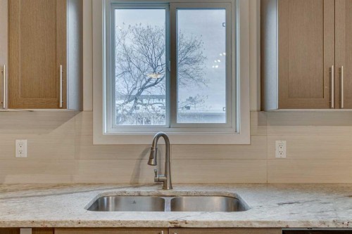 401-2203 14 Street Sw, Calgary, AB - Indoor Photo Showing Kitchen With Double Sink