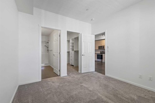 6318-151 Legacy Main Street Se, Calgary, AB - Indoor Photo Showing Other Room