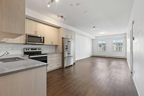 6318-151 Legacy Main Street Se, Calgary, AB - Indoor Photo Showing Kitchen With Stainless Steel Kitchen With Double Sink With Upgraded Kitchen