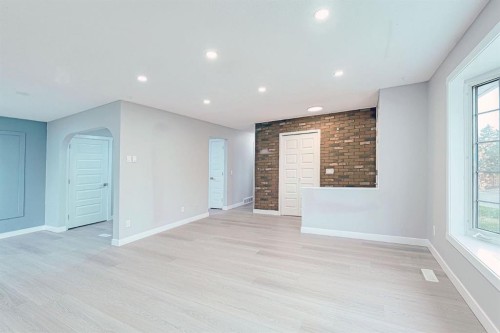 24 Rundleson Way Ne, Calgary, AB - Indoor Photo Showing Other Room